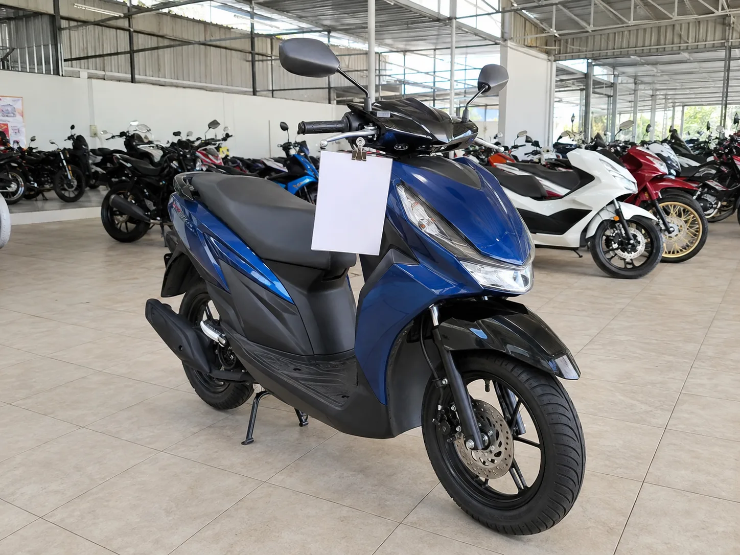 Honda Click 125i on the showroom floor at Rungrueang Motor Roi Et