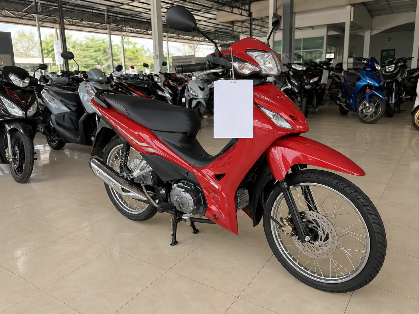 Honda Wave 110i on the showroom floor at Rungrueang Motor Roi Et